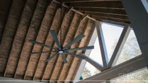 custom home exterior featuring covered porch, roofline detail, custom exterior craftsmanship in greenville, south carolina