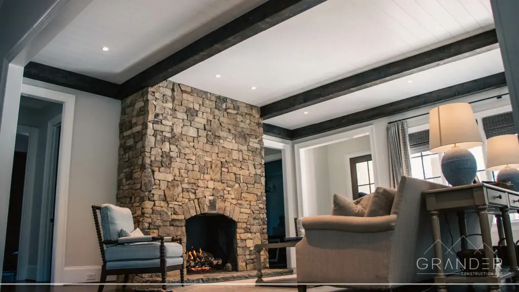 custom living room featuring fireplace, outdoor entertaining, custom stonework in greenville, south carolina