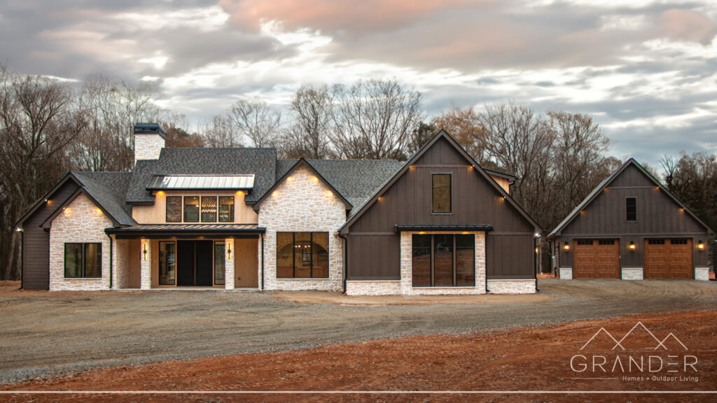 custom home exterior featuring covered porch, roofline detail, custom exterior craftsmanship in greer, south carolina