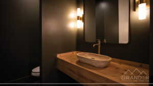 luxury bathroom featuring tile finishes, custom vanity in greer, south carolina